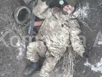 The Russian's brains were blown out.