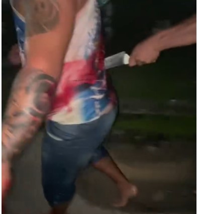 man had a knife stuck in his back