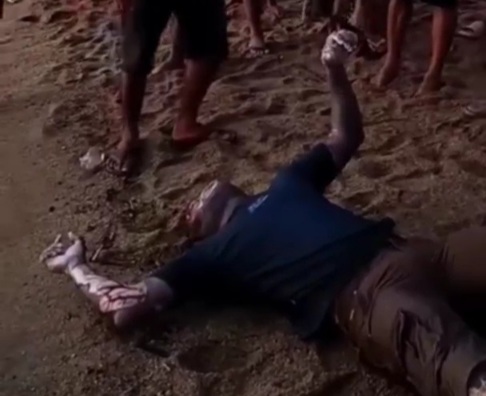 Drowned body on the beach 
