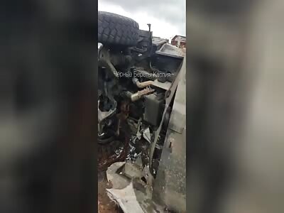 AFU carrier with a burned crew awaits the arrival of traffic police