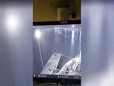 Men In Bike leaving from dock, Bike falls into sea, one of them drowns