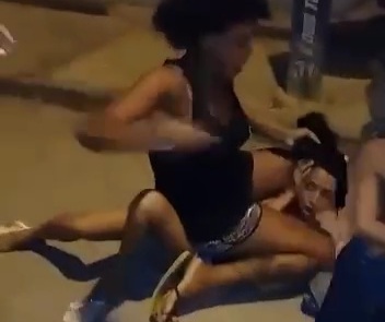 Free haircut and a savage beating for young mother in front of her kid