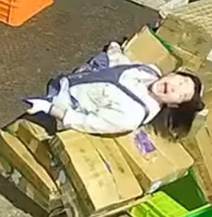 Lowered Tail Lift Delivery Truck Backing Up Hits Female Employee