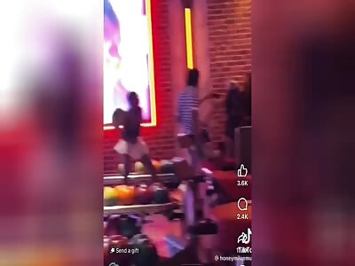 Black woman throw bowling balls