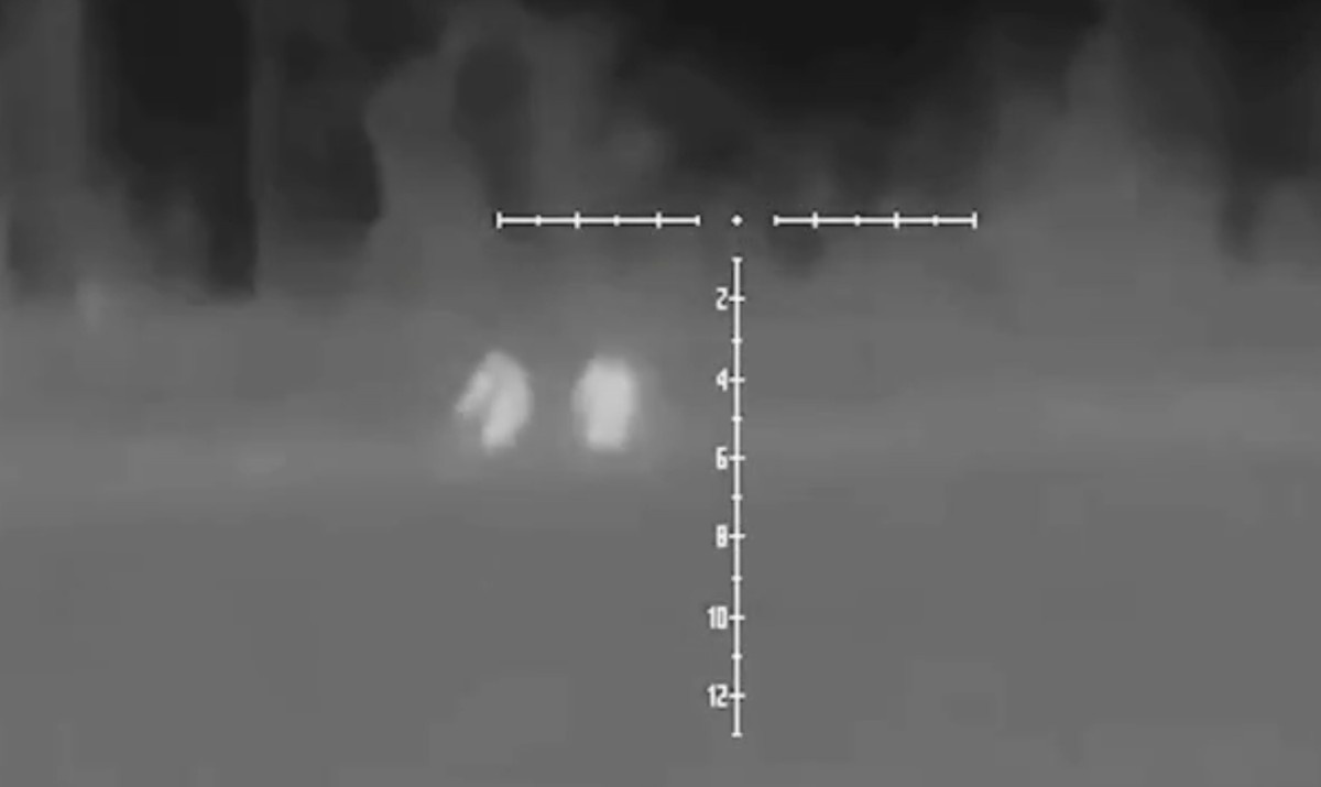 Sniper kills 2 Ukrainians with one bullet.