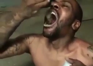 Prisoner Forced to Eat a Mouse