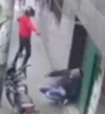 Dude Too Busy on Phone to See it Coming.