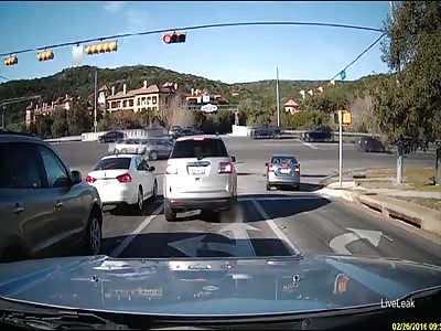 Dump truck barrels through red light, smashes cars