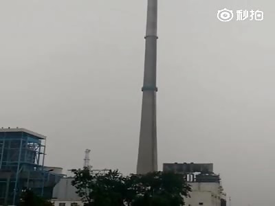 destruction of an old factory chimney