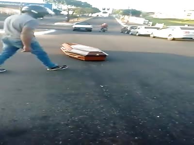 Coffin ejected out of the hearse