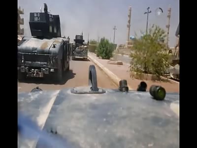 A suicide vehicle takes out a few vehicles  