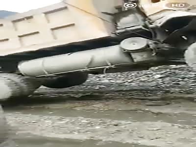 Crane tips over when lifting truck