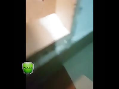 Police find drug lab behind a bedroom