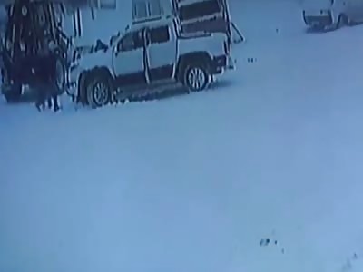 Woman Survives After Slipping Under Trucks Wheels