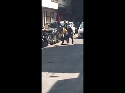 Fleeing Motorist Sends Cop Giving Him Ticket Flying