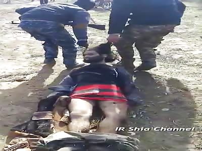  dead isis dragged by his hair