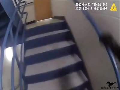 Police Officer Stops Suicidal Man From Jumping Off Rooftop Balcony