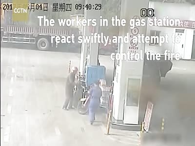 Oil suppliers put out fire on a motorcycle in a gas station in SW China