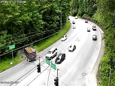 Driver lucky to be alive after dump truck T bones car