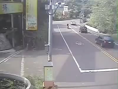 Twisty mountain road driver takes out two motorcyclists