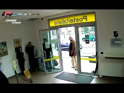 two man arrested over attempted armed robbery at post office