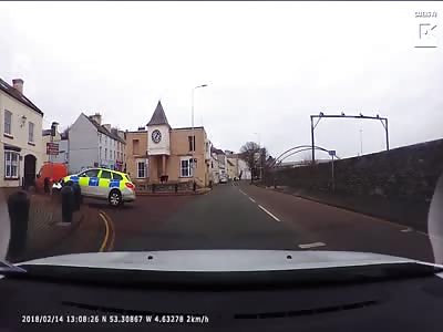 Dashcam Captures Police Car Crashes Into Bollard