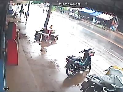 Car Sliding into Tree Captured on CCTV