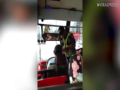 Cop Slaps Bus Driver