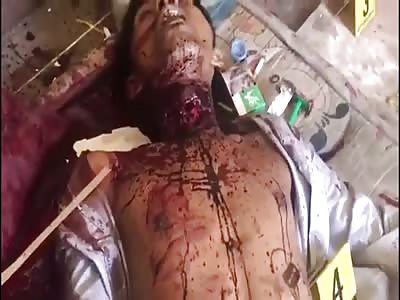 Two men with throats sliced found in poor crib