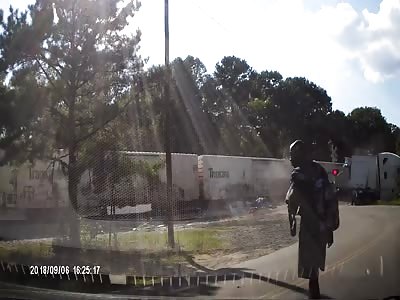 Semi-Trailer Sliced in Half by Freight Train 