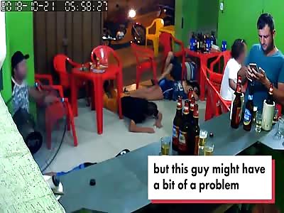 A bozo is so engrossed in his phone, he doesn't notice a robbery