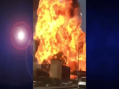 Explosion of gasoline truck in the road