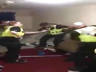 Copper thumping the shit out of a bloke with absolutely no context