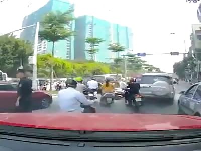 Trying to make a call in the middle of the street.