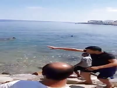 motorcycle thief gets a hard beating by angry people