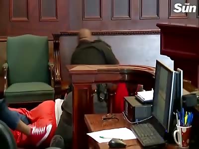 Sons of murdered mum attack her killer in court