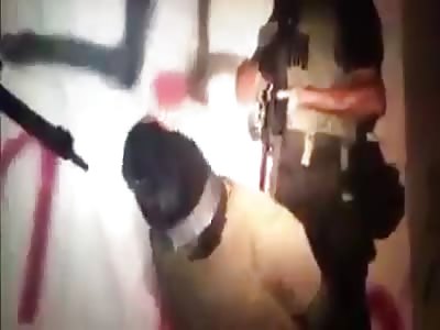 interrogation then execution of rival sicario by cartel