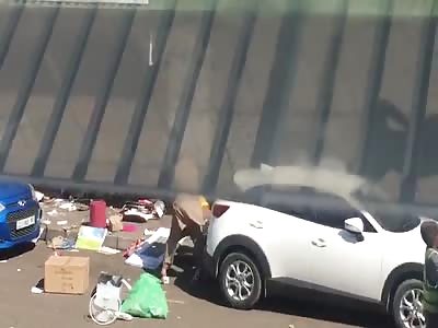 beating thief by owner in South Africa