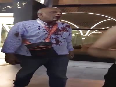 bloody face of old man after beating by security guards