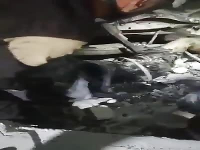 Digging out dead corps of young Syrian women al 