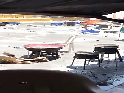 Fire in basketball court & sounds like gunshots & visible riot