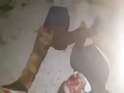 Libyan militia of haftar showing their dead enemies 