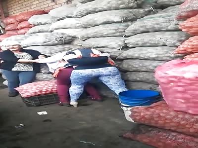Two latino women fighting 