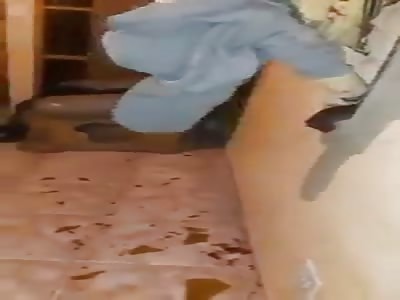 A burglar caught after getting stuck in a window.