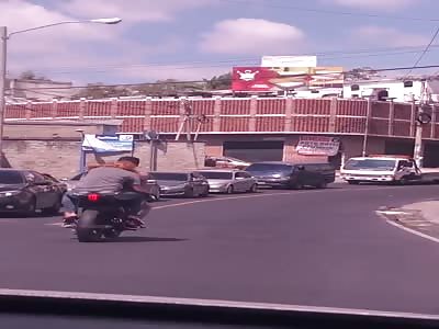 Drunk couple on motorcycle 