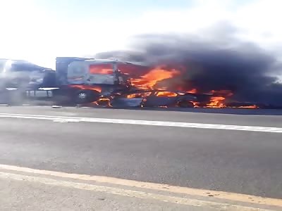 Three people were burnt beyond recognition when their car collided hea