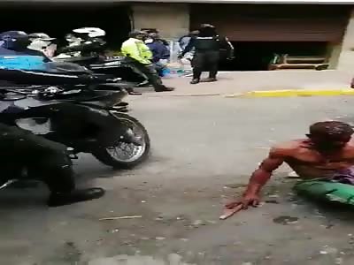 Thief saved by police from angry people 