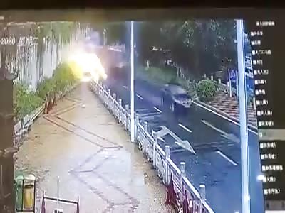 Bus accident on rainy day in Chinese street.