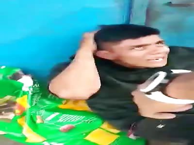 Crying thief holding red hat gets hard beating from angry crowds 