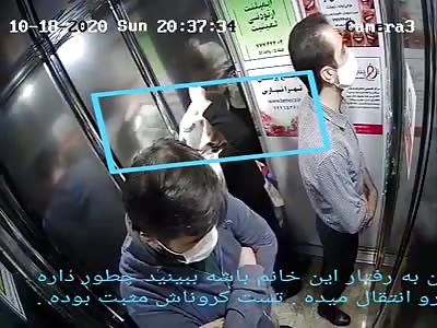 WOMAN SHARES HER CORONA COUGHING IN ELEVATOR.